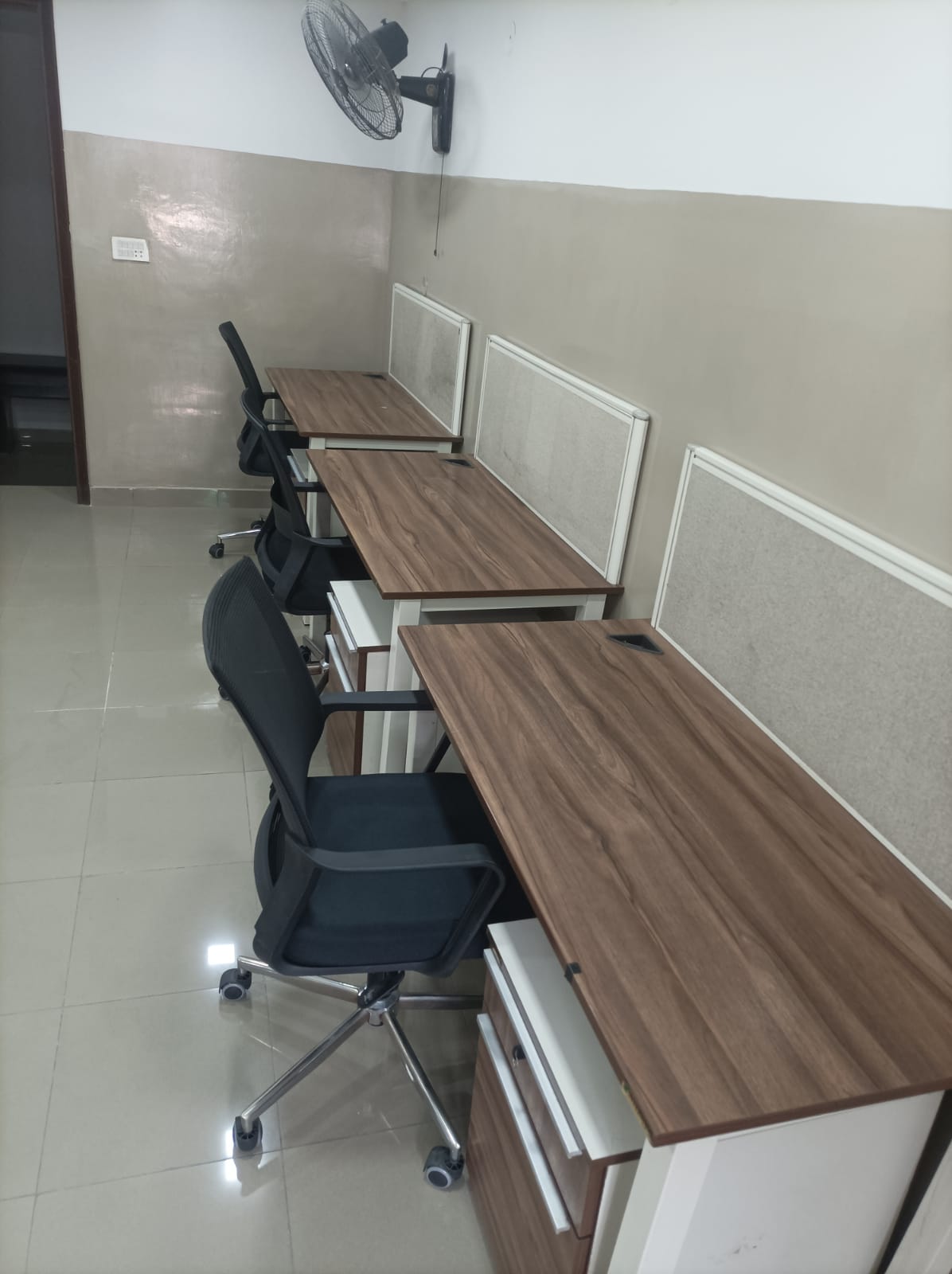 Dedicated wooden desks with lockable pedestal drawers at KAMH Lahore